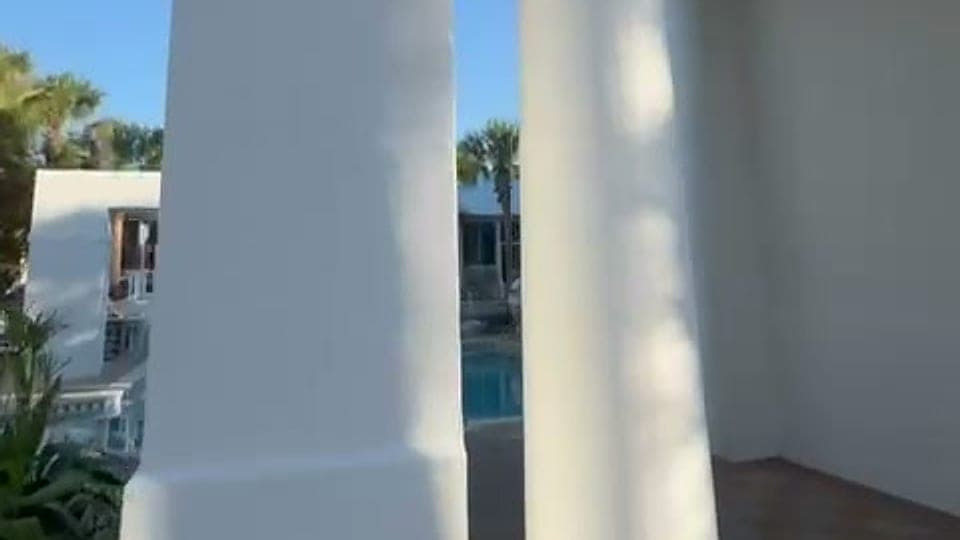 White columns beside a resort pool on the Florida Gulf Coast